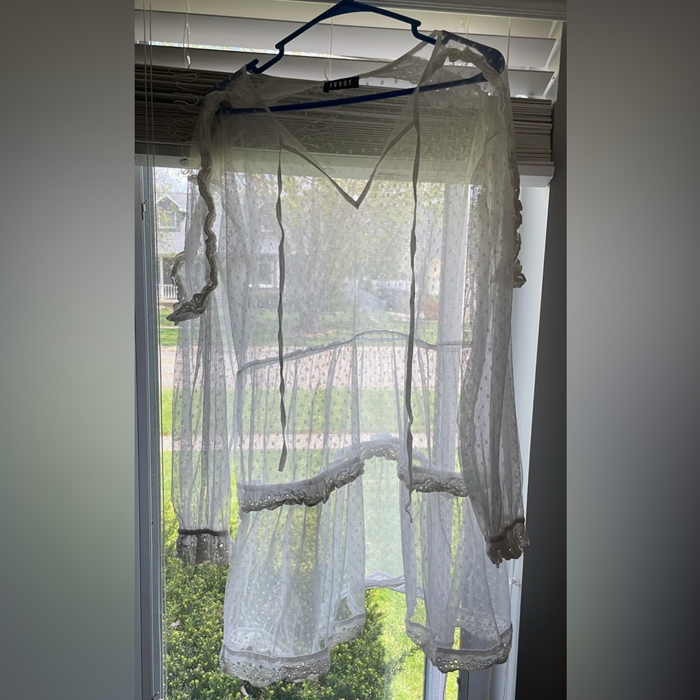 Women’s swim coverup. See through white. Polka dots.